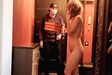 The delivery guy even dropped the money — she went out to get the pizza completely naked